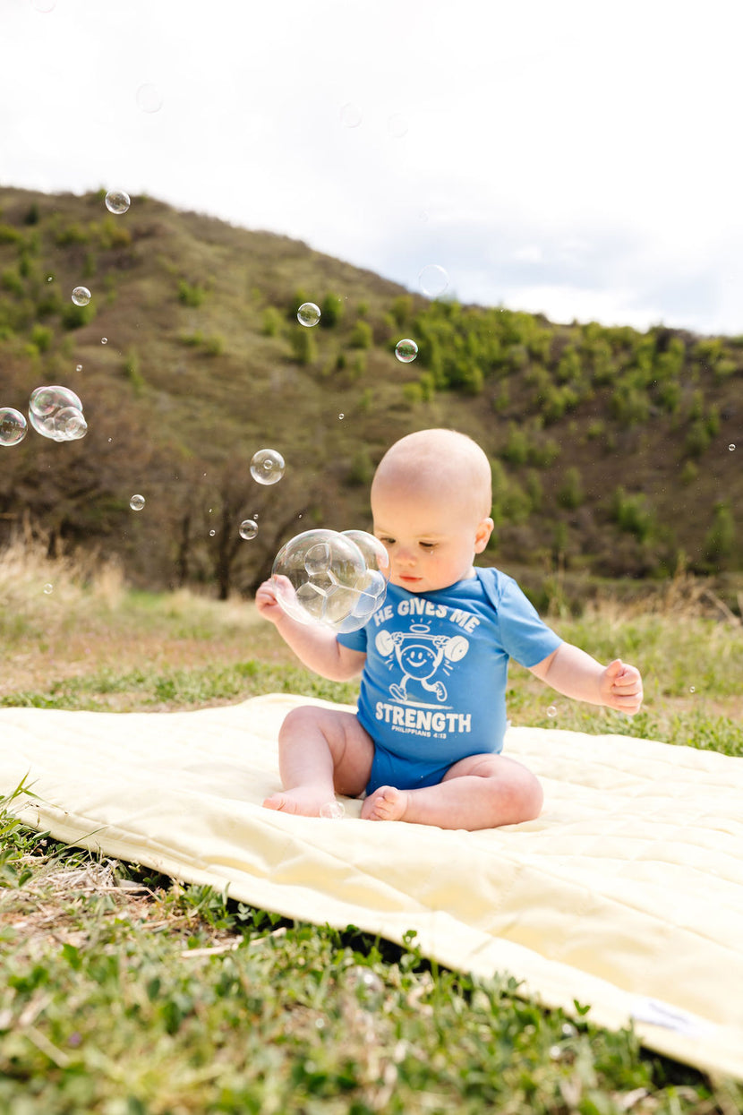Baby He Gives Me Strength Bodysuit Cotton | Short Sleeve