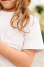 Kids Orchid Prayer Pocket T-Shirt | Short Sleeve